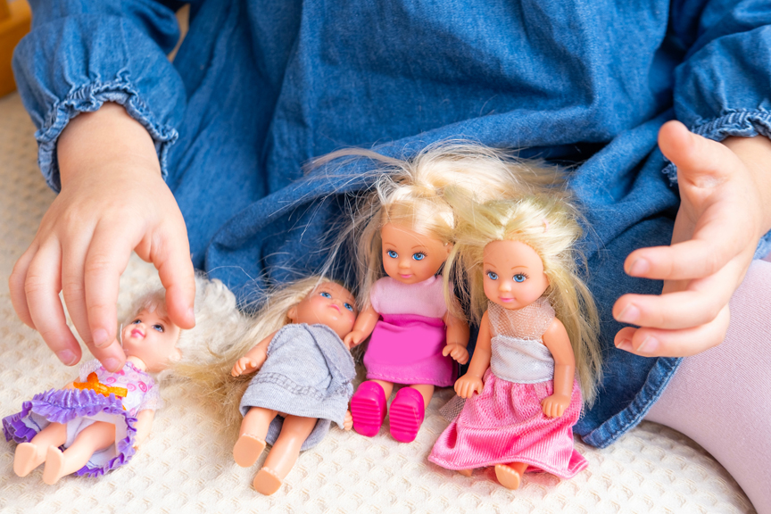 Child's hands using paint in a creative play activity